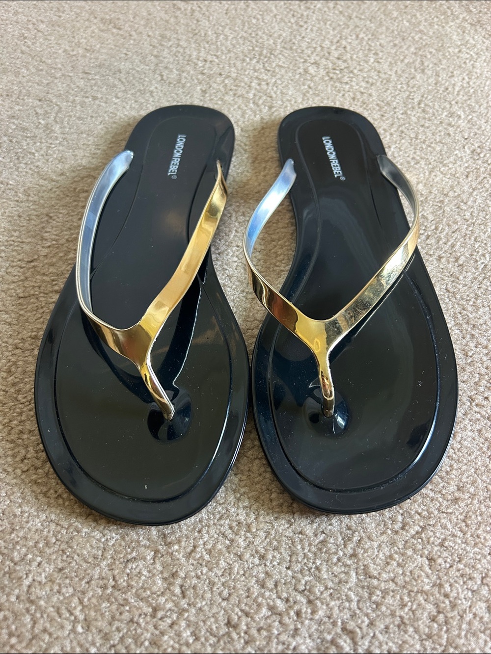 London rebel black and gold flip-flops